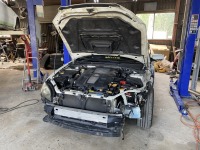 スバルレガシィの接触事故で破損したボディパーツを新品交換修理