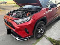 鹿と接触して破損したキャンディレッドボディのトヨタRAV4を修理