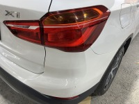 BMW X1 リアバンパー右角曲面の範囲小さな傷/変形を部分修理対応