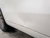 トヨタヴェルファイア 右スライドドア下側のへこみを板金塗装修理
